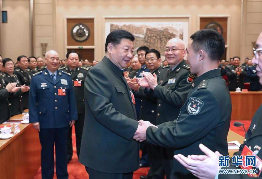  3月12日上午，中共中央總書記、國家主席、中央軍委主席習(xí)近平出席十三屆全國人大一次會議解放軍和武警部隊(duì)代表團(tuán)全體會議。